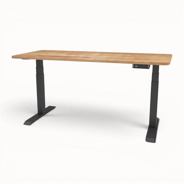 Solid oak desk with black metal legs on a white background