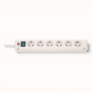 White power strip with multiple sockets on a white background