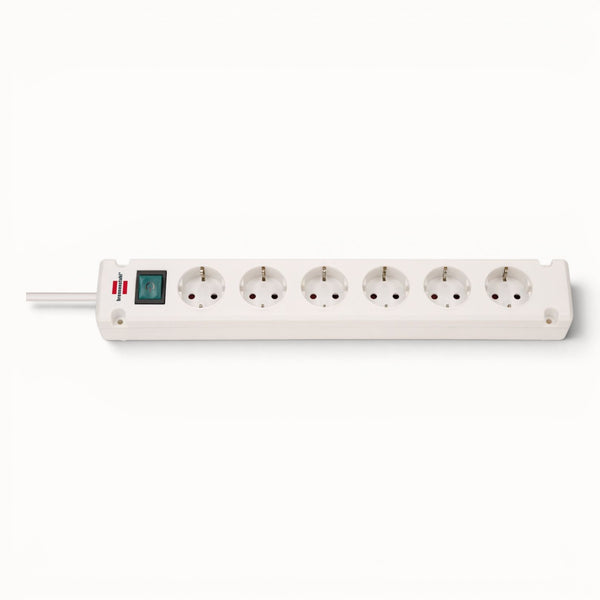 White power strip with multiple sockets on a white background