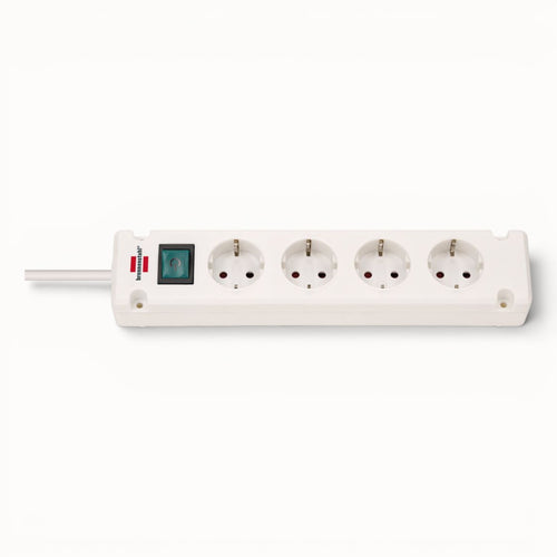 White power strip with multiple sockets on a white background