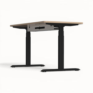 Stand-up desk with black frame and cable tray