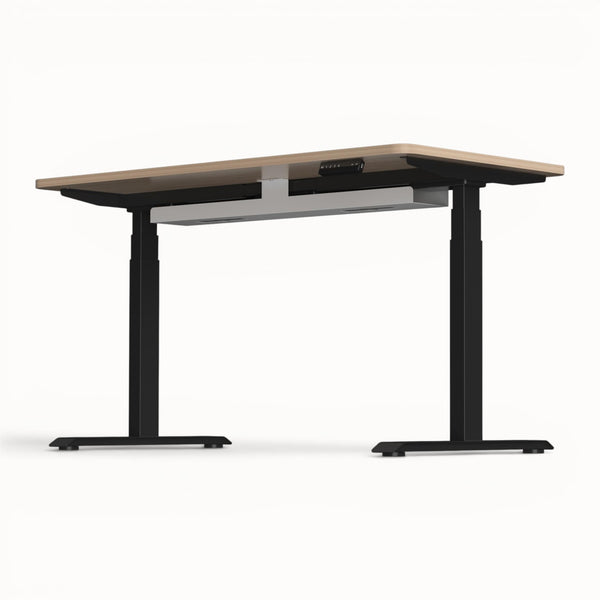 Height-adjustable desk with black cable tray