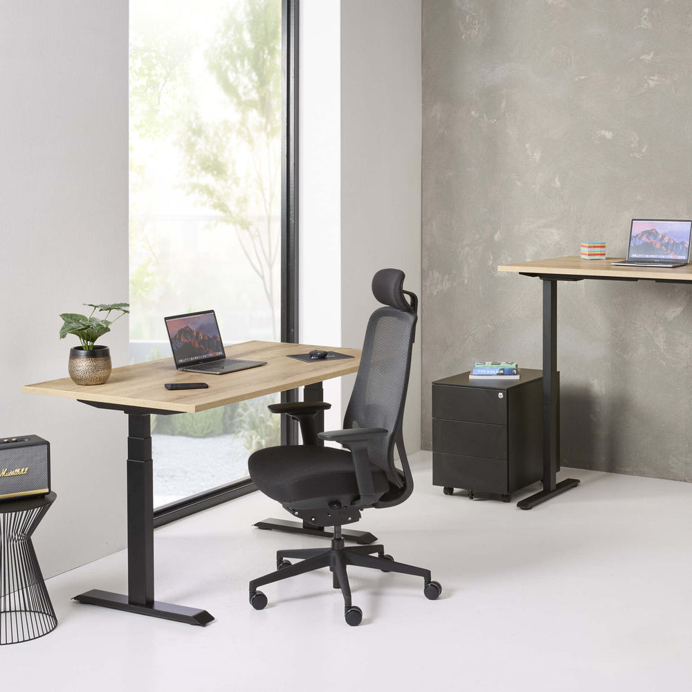 Ergonomic office chair with gray mesh back and seat on a white background