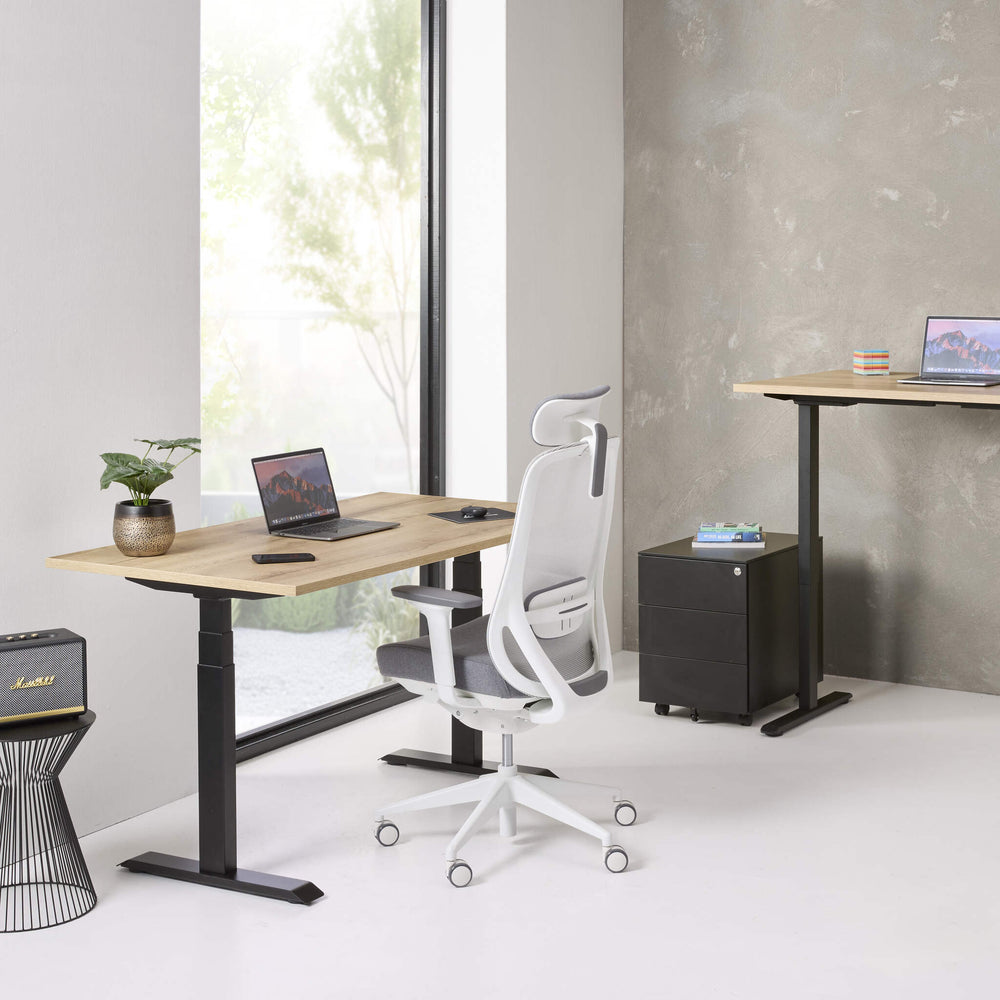 Ergonomic office chair with gray mesh back and seat on a white background