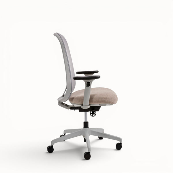 Ergonomic office chair with beige seat and gray frame on a white background