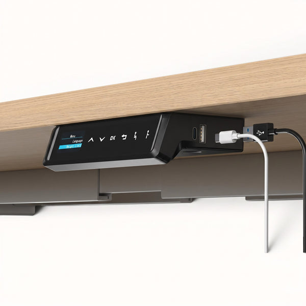 Under-desk power strip with USB ports on a light wood desk.