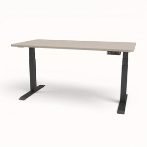 An adjustable standing desk with a light beige rectangular tabletop and a dark gray metal frame with dual legs and a control panel.