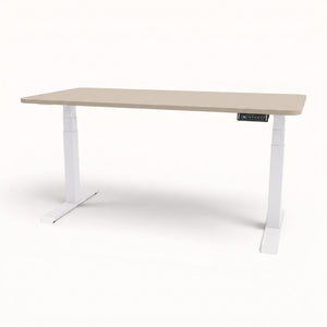 An adjustable standing desk with a light beige wood-grain top and white metal legs, featuring a small digital control panel on the right side.